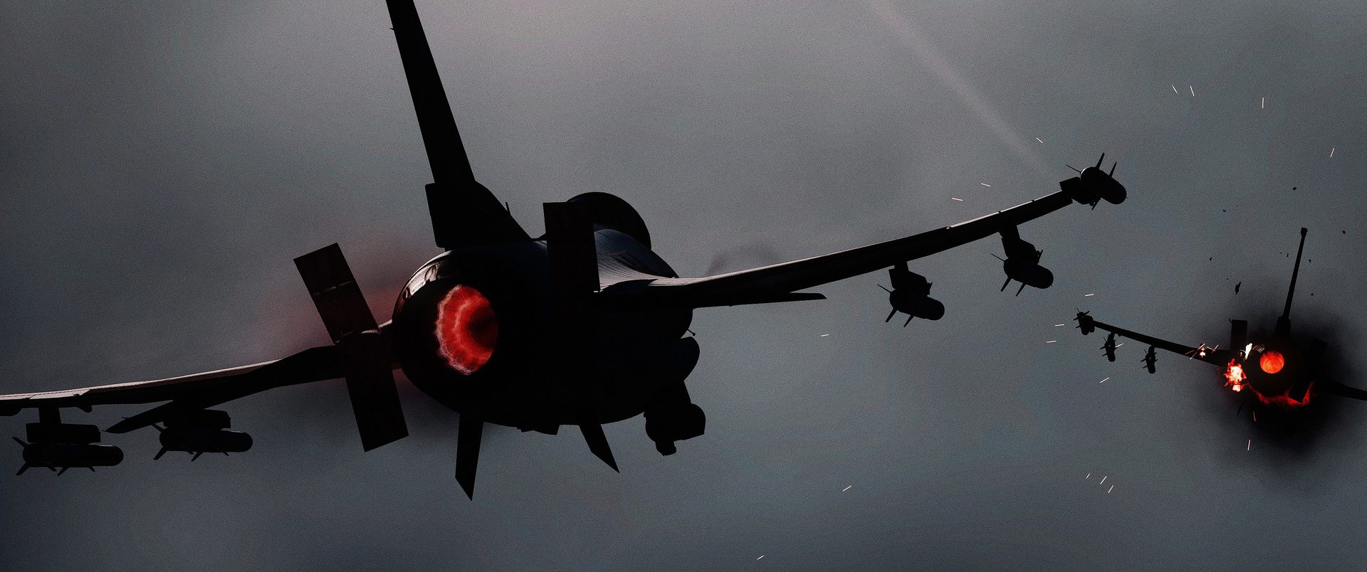 An F-16C in afterburner from behind